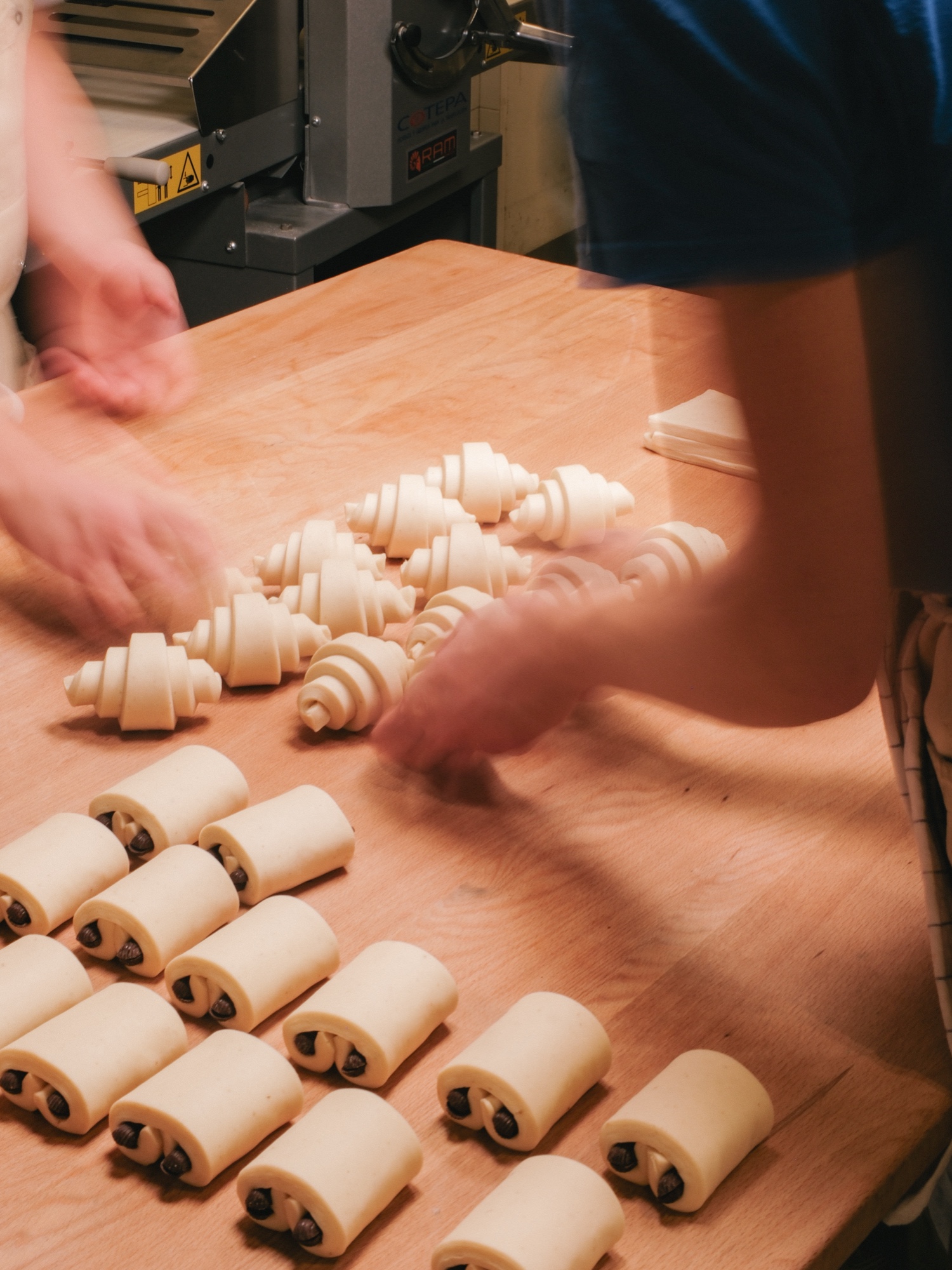 Hand-shaping croissants at Santo Bakehouse